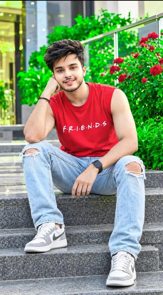 Stylish Boy in Red Sleeveless T-Shirt – Cinematic Outdoor Portrait