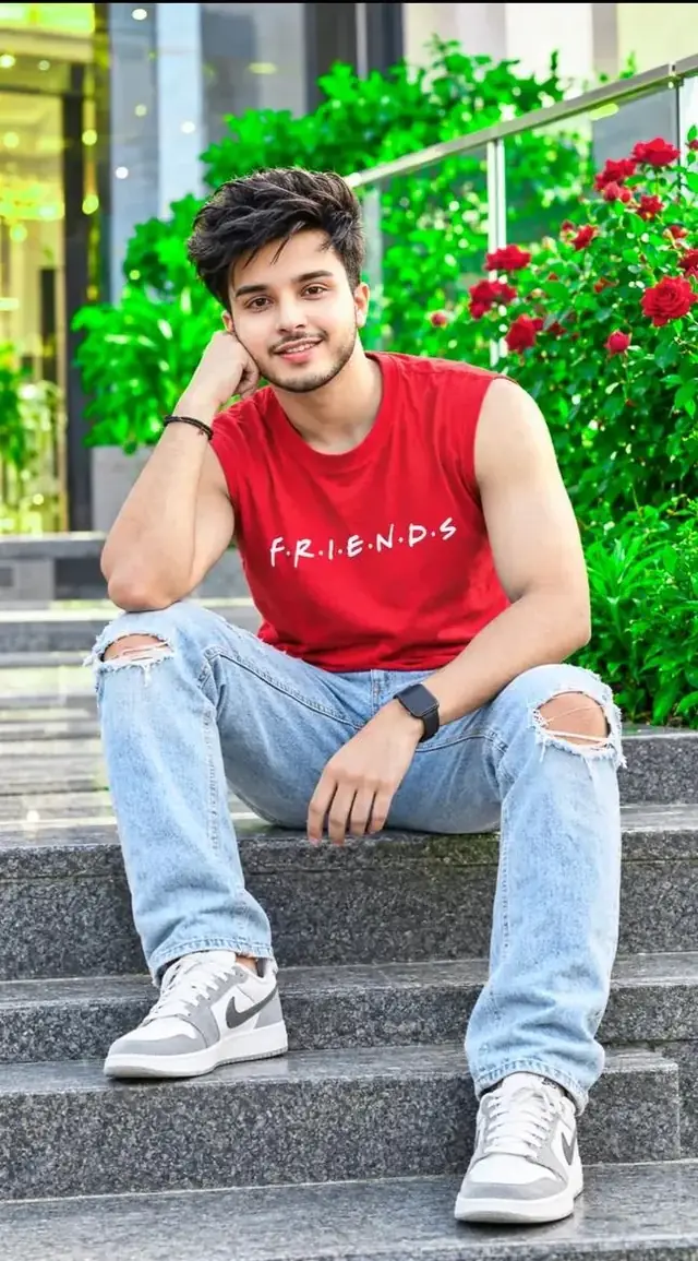 Stylish Boy in Red Sleeveless T-Shirt – Cinematic Outdoor Portrait
